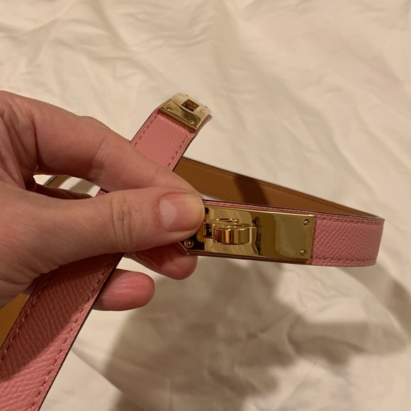 Thin  light pink golden buckle  fashionable belt size L adjustable 30.Must have!